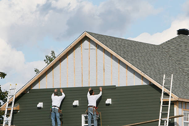 Professional Emergency Siding Repair technician working in Schwenksville, PA